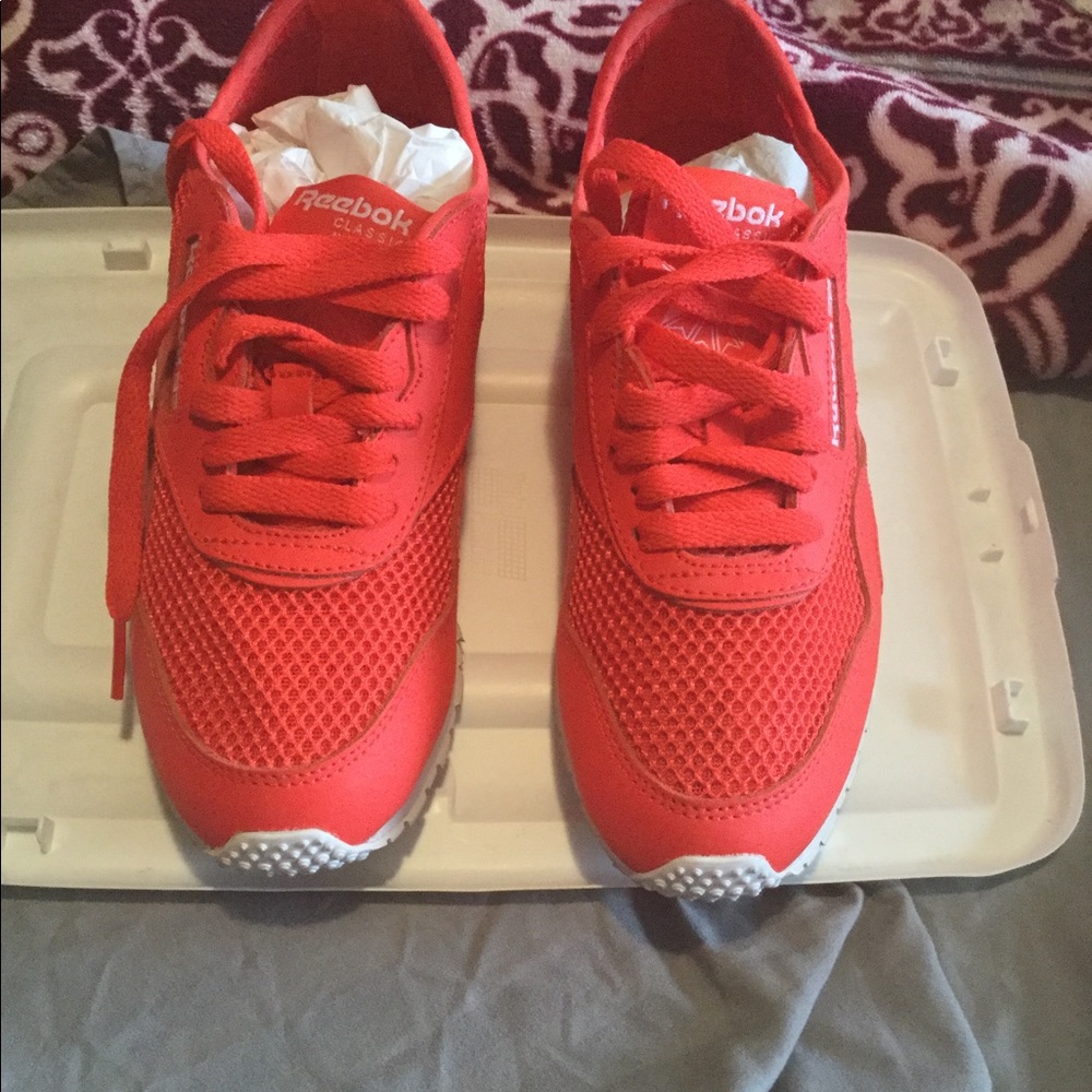 Bright red Reebok mesh sneakers